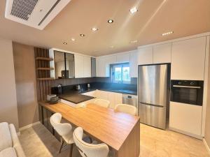 Η κουζίνα ή μικρή κουζίνα στο Privia Villas By Seven For Life