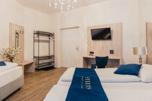Postel nebo postele na pokoji v ubytování Steens Hotel Alster City
