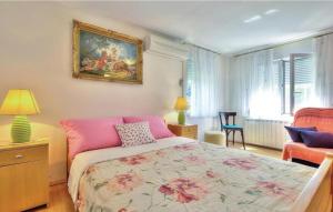 Postel nebo postele na pokoji v ubytování Apartments Sunce