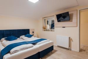 Postel nebo postele na pokoji v ubytování Steens Hotel Alster City