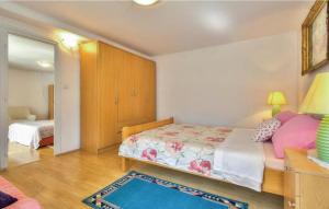 Postel nebo postele na pokoji v ubytování Apartments Sunce