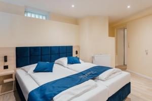 Postel nebo postele na pokoji v ubytování Steens Hotel Alster City