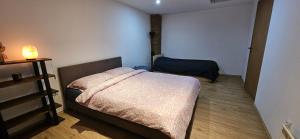 Postel nebo postele na pokoji v ubytování Apartman Zvijezda