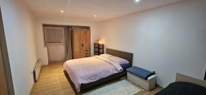 Postel nebo postele na pokoji v ubytování Apartman Zvijezda