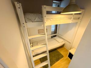 Duplex al lado de los Jardines del Turia emeletes ágyai egy szobában