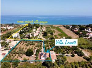 an aerial view of a villa with the ocean at Villa Levante, relax esclusivo in riva al mare vicino Cefalù in Lascari
