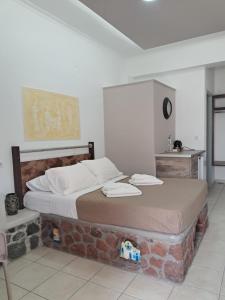 Katil atau katil-katil dalam bilik di Villa Nektaria