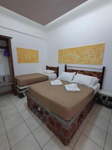 Katil atau katil-katil dalam bilik di Villa Nektaria