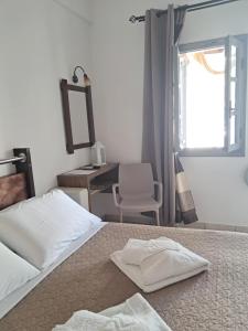 Katil atau katil-katil dalam bilik di Villa Nektaria
