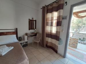 Katil atau katil-katil dalam bilik di Villa Nektaria