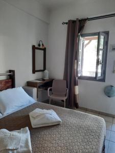 Katil atau katil-katil dalam bilik di Villa Nektaria