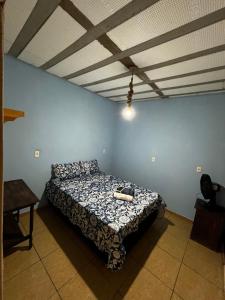Postel nebo postele na pokoji v ubytování Casa Oliveira