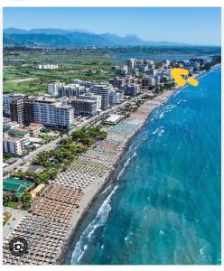an aerial view of a beach with buildings and the ocean at Apartamente Antoni Shengjin2 in Shëngjin