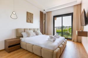 Postel nebo postele na pokoji v ubytování Élégance et confort 3 chambre sur le golf de Noria + 39 fotografií