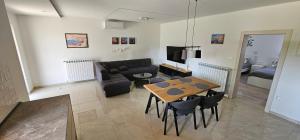 Η κουζίνα ή μικρή κουζίνα στο Apartman M&L