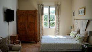 Postel nebo postele na pokoji v ubytování Bastide Clementine + 16 fotografií