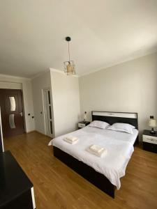 Postel nebo postele na pokoji v ubytování Guest-House Mimino