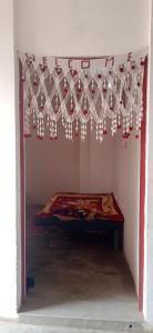 Postel nebo postele na pokoji v ubytování Ranjeet Homestay