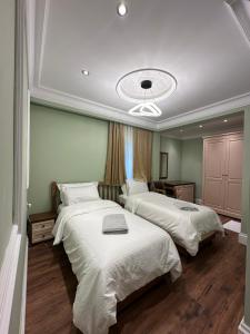 Postel nebo postele na pokoji v ubytování Flored Hotel