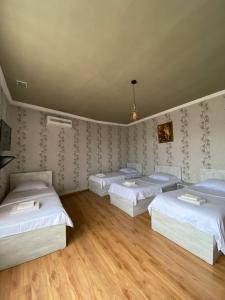 Postel nebo postele na pokoji v ubytování Guest-House Mimino