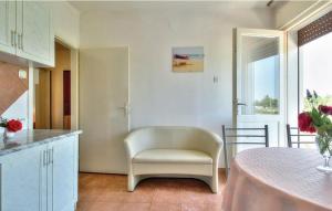 Kuchyň nebo kuchyňský kout v ubytování Apartments Sunce