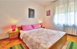 Postel nebo postele na pokoji v ubytování Apartments Sunce