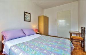 Postel nebo postele na pokoji v ubytování Apartments Sunce