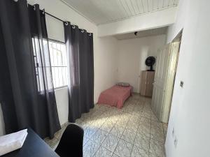 Voodi või voodid majutusasutuse Quarto individual toas