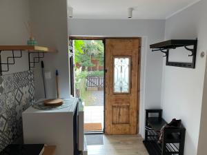 Kuchyňa alebo kuchynka v ubytovaní Zaciszny Apartament w Zdroju