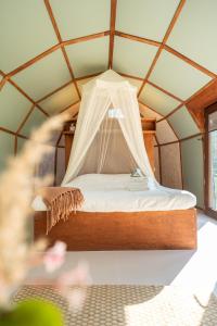 Ένα ή περισσότερα κρεβάτια σε δωμάτιο στο Cabin Buteo Buteo
