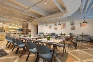 Posezení v ubytování Hotel Loft Near IGI Airport Delhi