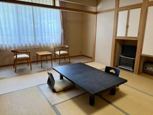 Posezení v ubytování 聖山パノラマホテル
