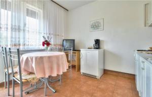 Kuchyň nebo kuchyňský kout v ubytování Apartments Sunce