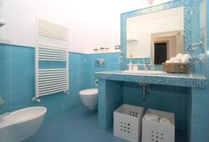 Ванная комната в Taonasi Mazzarò Apartments