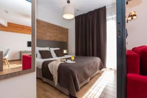 Postel nebo postele na pokoji v ubytování Résidence Prestige Odalys Isatis + 37 fotografií