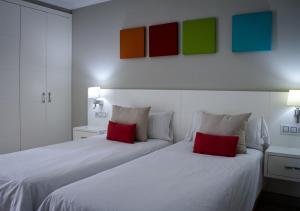 Ein Bett oder Betten in einem Zimmer der Unterkunft Holiday Club Vista Amadores