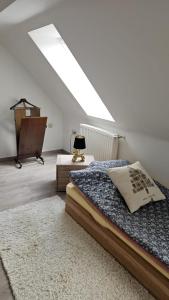 Ένα ή περισσότερα κρεβάτια σε δωμάτιο στο Apartment am Ulmerfelder Marktplatz
