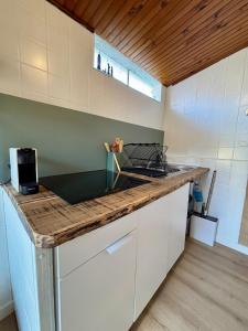 a kitchen with a counter top and a sink at Studio Bougainvillier in La Seyne-sur-Mer