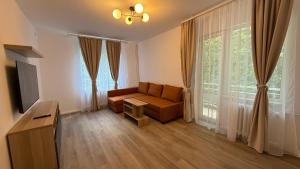 TV a/nebo společenská místnost v ubytování Cazare langa Spitalul Bagdasar-Parcare Inclusa