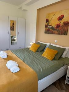 Postel nebo postele na pokoji v ubytování Apartman Ferenac + 37 fotografií