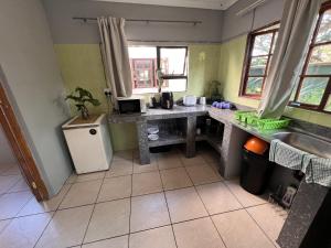 Cucina o angolo cottura di Moz-Tree Inn
