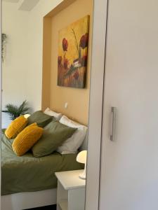 Postel nebo postele na pokoji v ubytování Apartman Ferenac