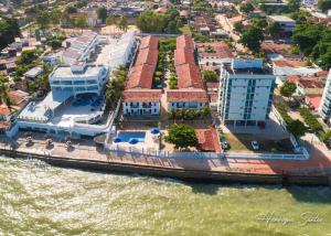 an aerial view of a resort on the water at Apto Beira Mar - Morada das Ondas in Paulista