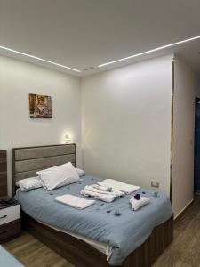Кровать или кровати в номере Go Vibes Pyramids View INN
