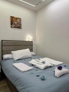Кровать или кровати в номере Go Vibes Pyramids View INN