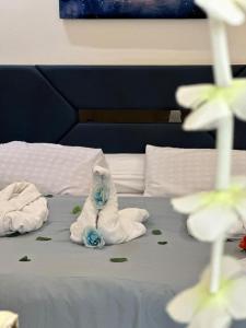Кровать или кровати в номере Go Vibes Pyramids View INN