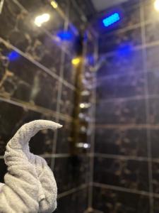 Ванная комната в Go Vibes Pyramids View INN