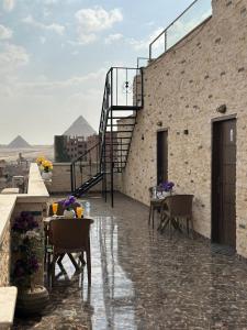 Балкон или терраса в Go Vibes Pyramids View INN