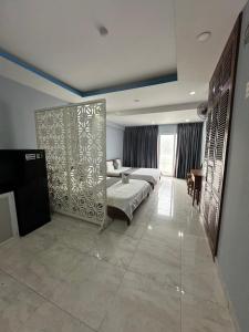 Postel nebo postele na pokoji v ubytování Nam Anh 2 Hotel