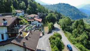 an aerial view of a village in the mountains at La Casa Del Lupo in Serina